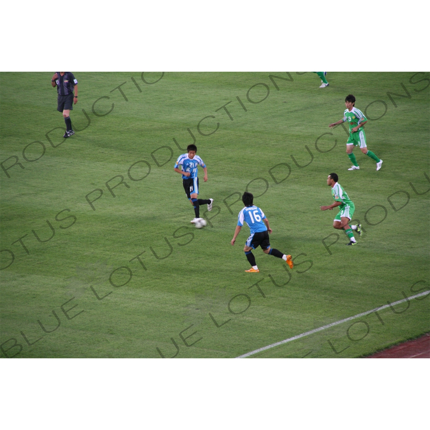 Players in a Chinese Super League Match between Beijing Guoan and Dalian Shide at the Workers' Stadium (Gongren Tiyuchang) in Beijing