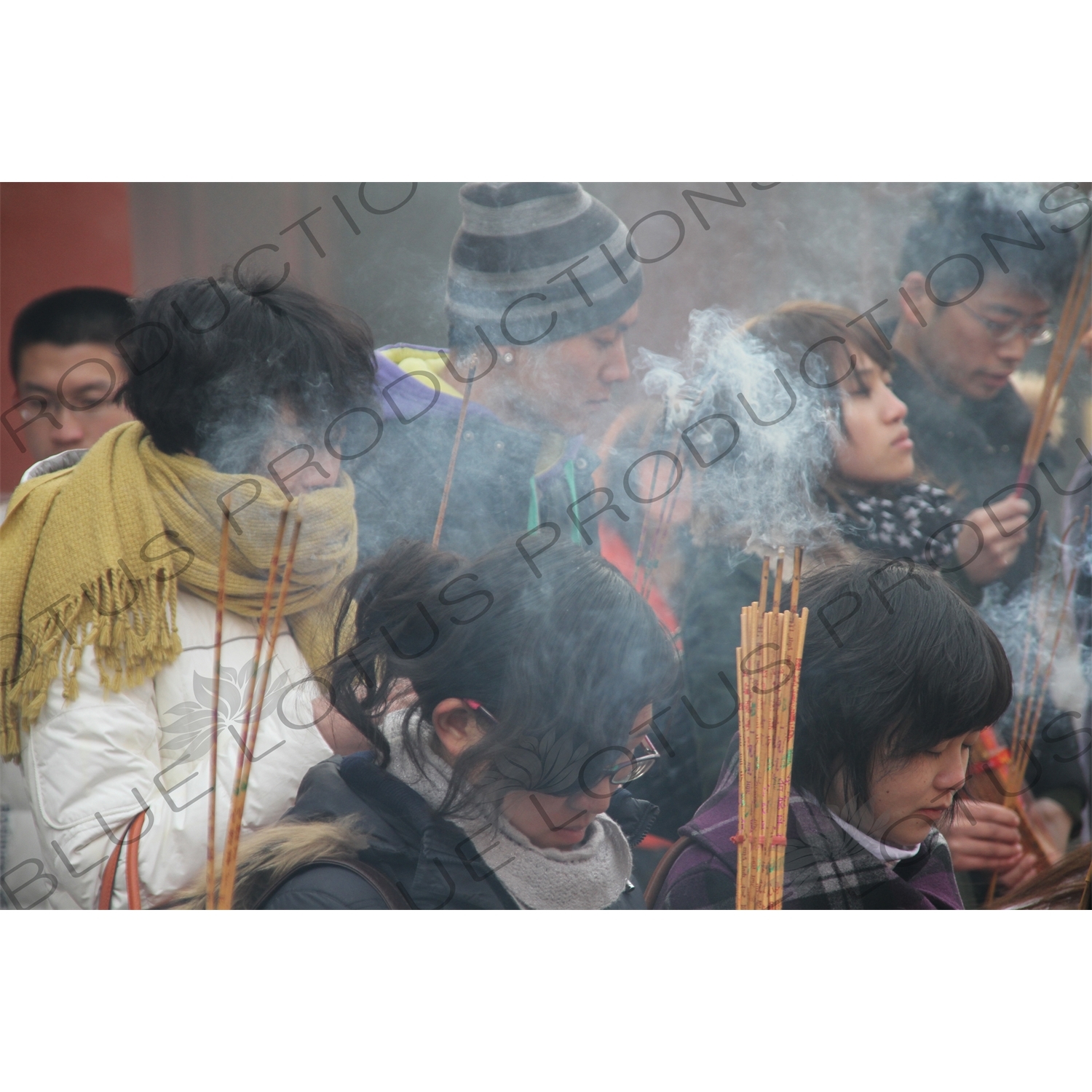 People Burning Incense in the Lama Temple (Yonghegong) in Beijing