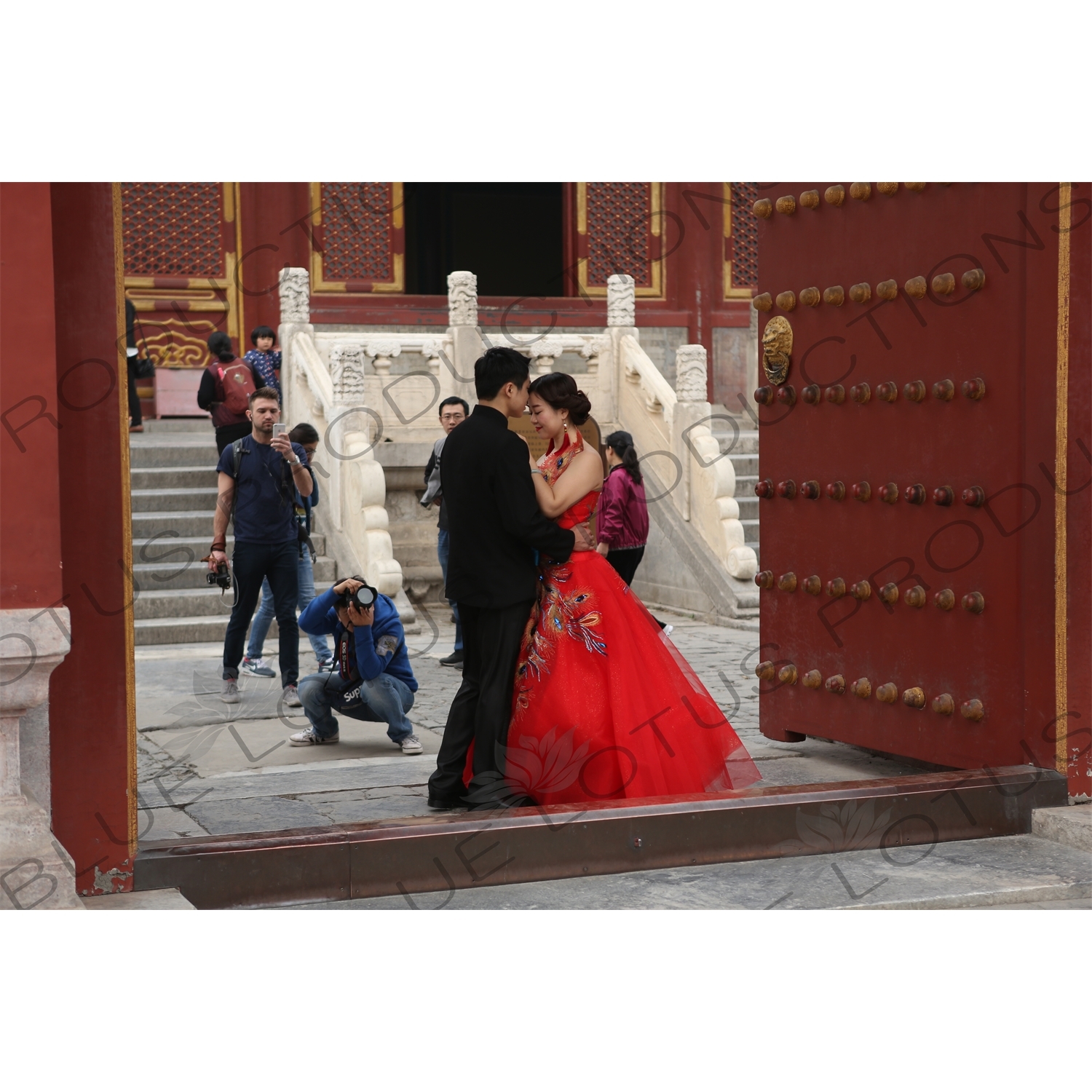 Married Couple Getting Their Picture Taken in the Hall of Prayer for Good Harvests (Qi Nian Dian) Compound in the Temple of Heaven (Tiantan) in Beijing