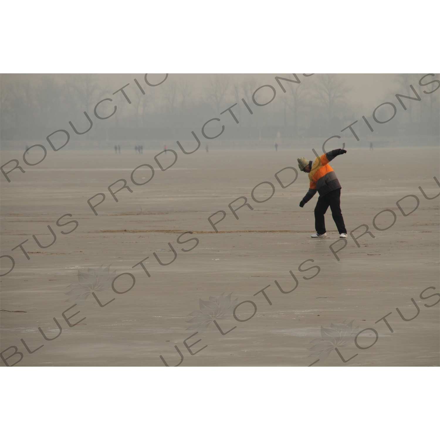 Man Slipping on a Frozen Kunming Lake in the Summer Palace in Beijing