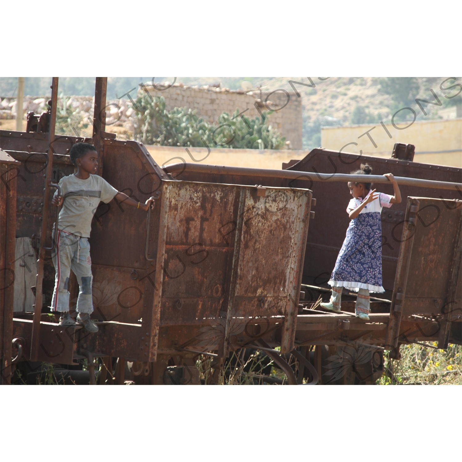 Children Playing on an Old Railway Car in a Station along the Asmara to Massawa Railway Line