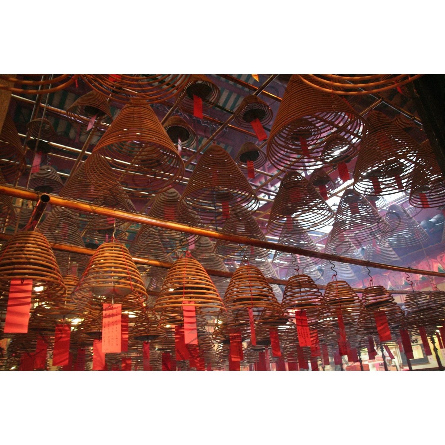 Burning Incense Cones inside Man Mo Temple in Hong Kong