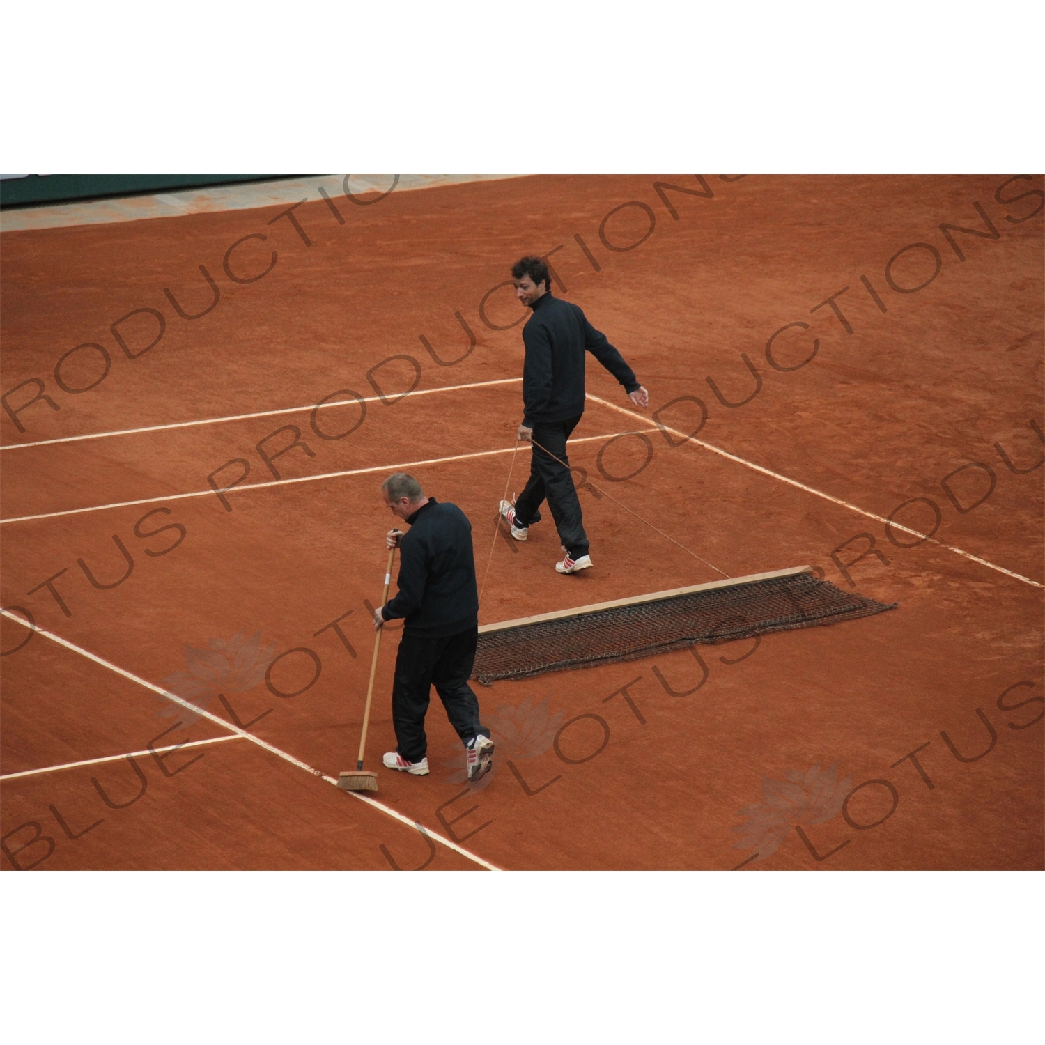 Men Preparing Philippe Chatrier Court at the French Open/Roland Garros in Paris