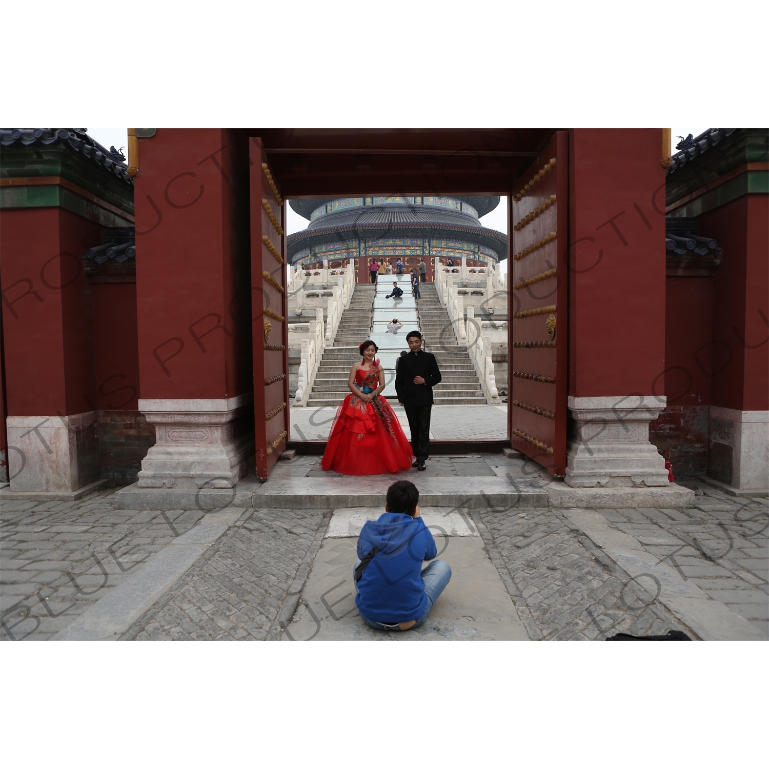 Married Couple Getting Their Picture Taken in the Hall of Prayer for Good Harvests (Qi Nian Dian) Compound in the Temple of Heaven (Tiantan) in Beijing