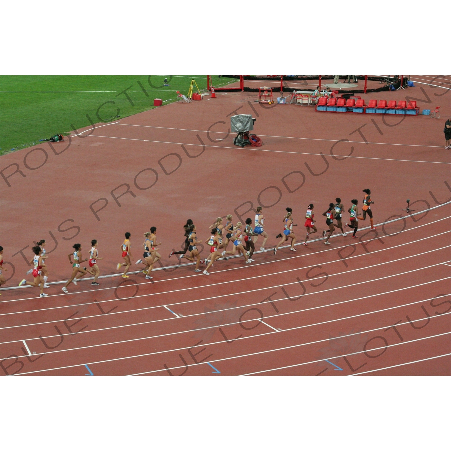 Athletes in a Women's 3,000 Metre Steeplechase Heat in the Bird's Nest/National Stadium (Niaochao/Guojia Tiyuchang) in the Olympic Park in Beijing