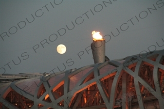 Olympic Flame in the Bird's Nest/National Stadium (Niaochao/Guojia Tiyuchang) and the Moon in the Olympic Park in Beijing