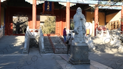 Statue of Confucius in front of the Gate of Great Success (Dacheng Men) in the Confucius Temple in Beijing