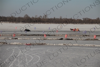 Vehicles Driving across the Songhua River in Harbin