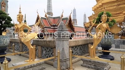 Gold Kinnara Statues at the Emerald Temple/Chapel (Wat Phra Kaew) at the Grand Palace (Phra Borom Maha Ratcha Wang) in Bangkok