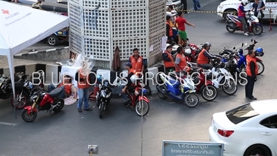 Motorcycle Taxis in front of Siam BTS Station in Bangkok