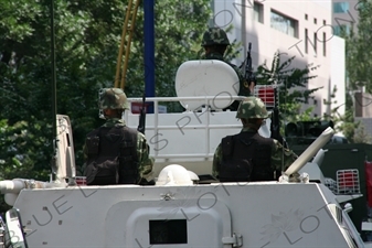 Chinese People's Armed Police Force/PAP (Zhongguo Renmin Wuzhuang Jingcha Budui/Wujing) Officers in an Armoured Personnel Carrier in Urumqi