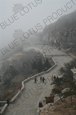 Porters Carrying Loads at the Summit of Mount Tai (Tai Shan) in Shandong Province