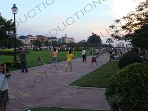 People Playing Badminton in a Park near the Royal Palace in Phnom Penh