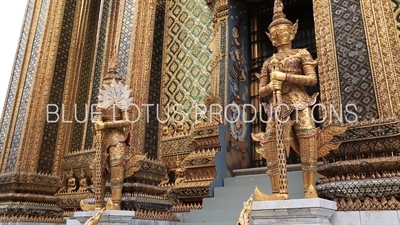 Gold Yaksha Statues outside Phra Mondop at the Emerald Temple/Chapel (Wat Phra Kaew) at the Grand Palace (Phra Borom Maha Ratcha Wang) in Bangkok