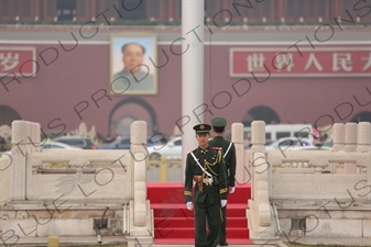 Soldiers Changing the Guard at the Base of the Flagpole in Tiananmen Square in Beijing