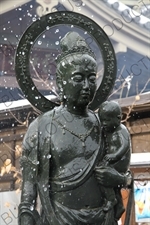 Jizo Statue Holding a Baby in Zenko-ji in Nagano