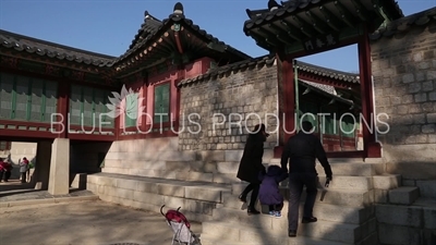 People Walking Through Yeochun Gate (Yeochunmun) at Changdeok Palace (Changdeokgung) in Seoul