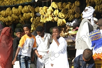 Children in front of a Fruit Stall in Keren