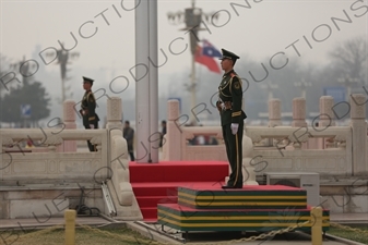 Soldiers Standing Guard at the Base of the Flagpole in Tiananmen Square in Beijing