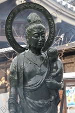 Jizo Statue Holding a Baby in Zenko-ji in Nagano