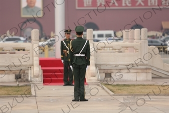 Soldiers Changing the Guard at the Base of the Flagpole in Tiananmen Square in Beijing