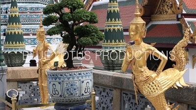 Gold Kinnara Statues at the Emerald Temple/Chapel (Wat Phra Kaew) at the Grand Palace (Phra Borom Maha Ratcha Wang) in Bangkok