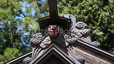 Demon Head Carving on Roof of Arakura Sengen Shrine in Fujiyoshida