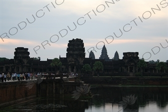 People Walking along Causeway Leading to Angkor Wat