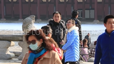 Tourists in front of Geunjeong Hall (Geunjeongjeon) at Gyeongbok Palace (Gyeongbokgung) in Seoul