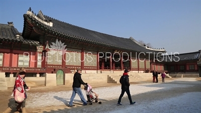 People Walking in front of Gyotae Hall (Gyotaejeon) at Gyeongbok Palace (Gyeongbokgung) in Seoul