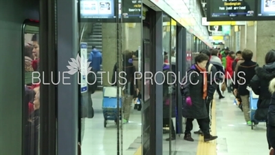 People Getting on and off a Train in a Seoul Metro station