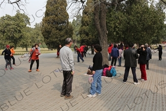 People Practising Taiji Bailong Ball/Taiji Rouli Qiu near the North Gate of the Temple of Heaven (Tiantan) in Beijin