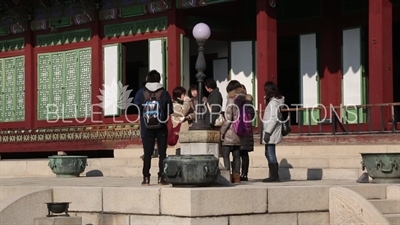 People in front of Daejo Hall (Daejojeon) at Changdeok Palace (Changdeokgung) in Seoul