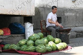 Watermelon Seller on a Street in Urumqi