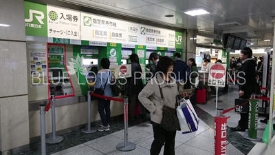 People Buying Tickets in Tokyo Station