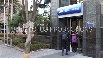 People Walking in to Citibank in Seoul