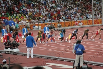 Athletes at the Start of a Men's 100 Metres Heat in the Bird's Nest/National Stadium (Niaochao/Guojia Tiyuchang) in the Olympic Park in Beijing