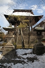 Stone Lanterns and Bell Tower (Shoro) of Zenko-ji in Nagano