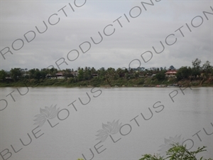 Houses on a Bank of the Mekong River