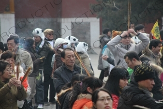 People Burning Incense in the Lama Temple (Yonghegong) in Beijing