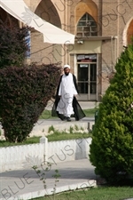 Muslim Cleric Walking through Naqsh-e Jahan Square in Esfahan/Isfahan