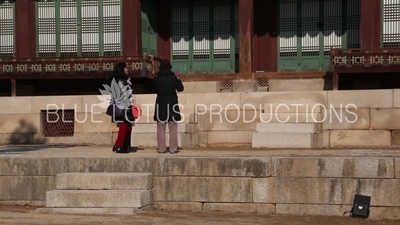 People Talking on Steps of Yanghwa Hall (Yanghwadang) at Changgyeong Palace (Changgyeonggung) in Seoul