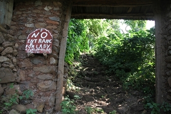 'No Entrance for Lady' Sign at Entrance to a Church next to Lake Tana