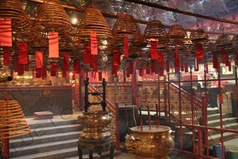 Burning Incense Cones inside Man Mo Temple in Hong Kong