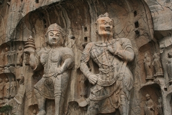 Two Sculptures in Fengxian Temple/Grotto (Fengxian Si) at the Longmen Grottoes (Longmen Shiku) near Luoyang