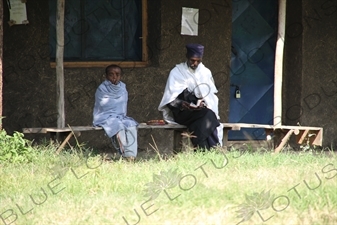 Priest and Pupil outside a Church next to Lake Tana