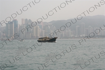 Boat Sailing through Hong Kong Harbour