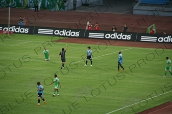 Yellow Card During a Chinese Super League Match between Beijing Guoan and Dalian Shide at the Workers' Stadium (Gongren Tiyuchang) in Beijing