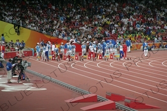 Athletes Lining up for a Men's 100 Metres Heat in the Bird's Nest/National Stadium (Niaochao/Guojia Tiyuchang) in the Olympic Park in Beijing