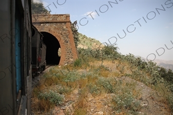 Vintage Steam Engine Travelling through a Tunnel on the Asmara to Massawa Railway Line